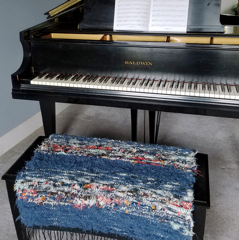 “I put one of Kathy’s smaller rugs on my piano bench, and it’s allowing me to play longer and more often than ever. Never has playing the piano been so comfortable. -Eric S.